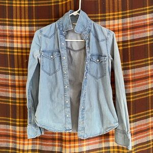 Light blue denim, collared button-up shirt